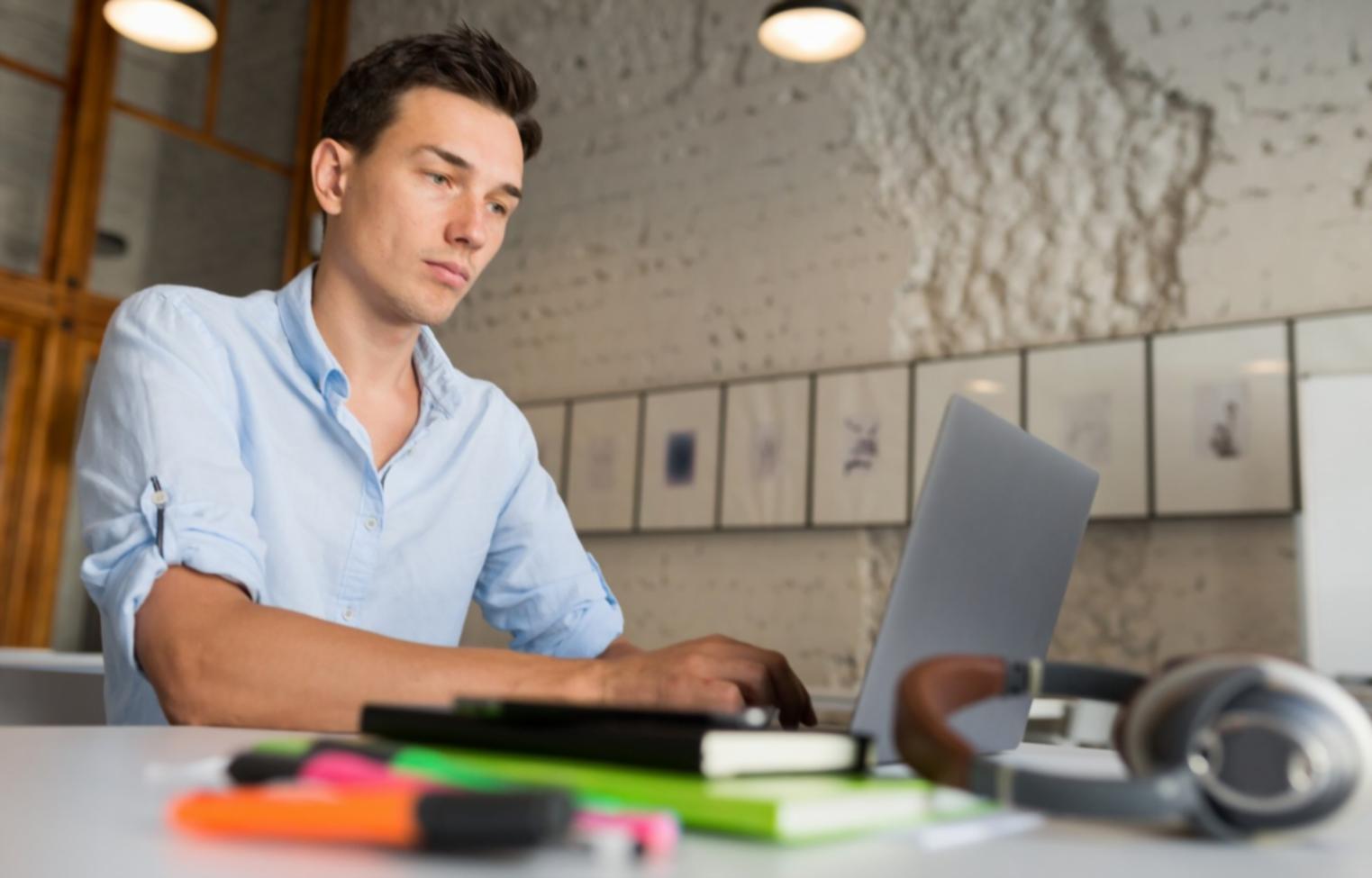Educational materials and charts spread on a desk showing investment planning resources